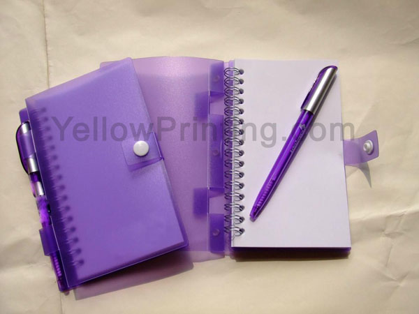 coil notebook with ball pen